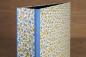 Preview: blue and yellow file folder with a twist, handmade in our factory